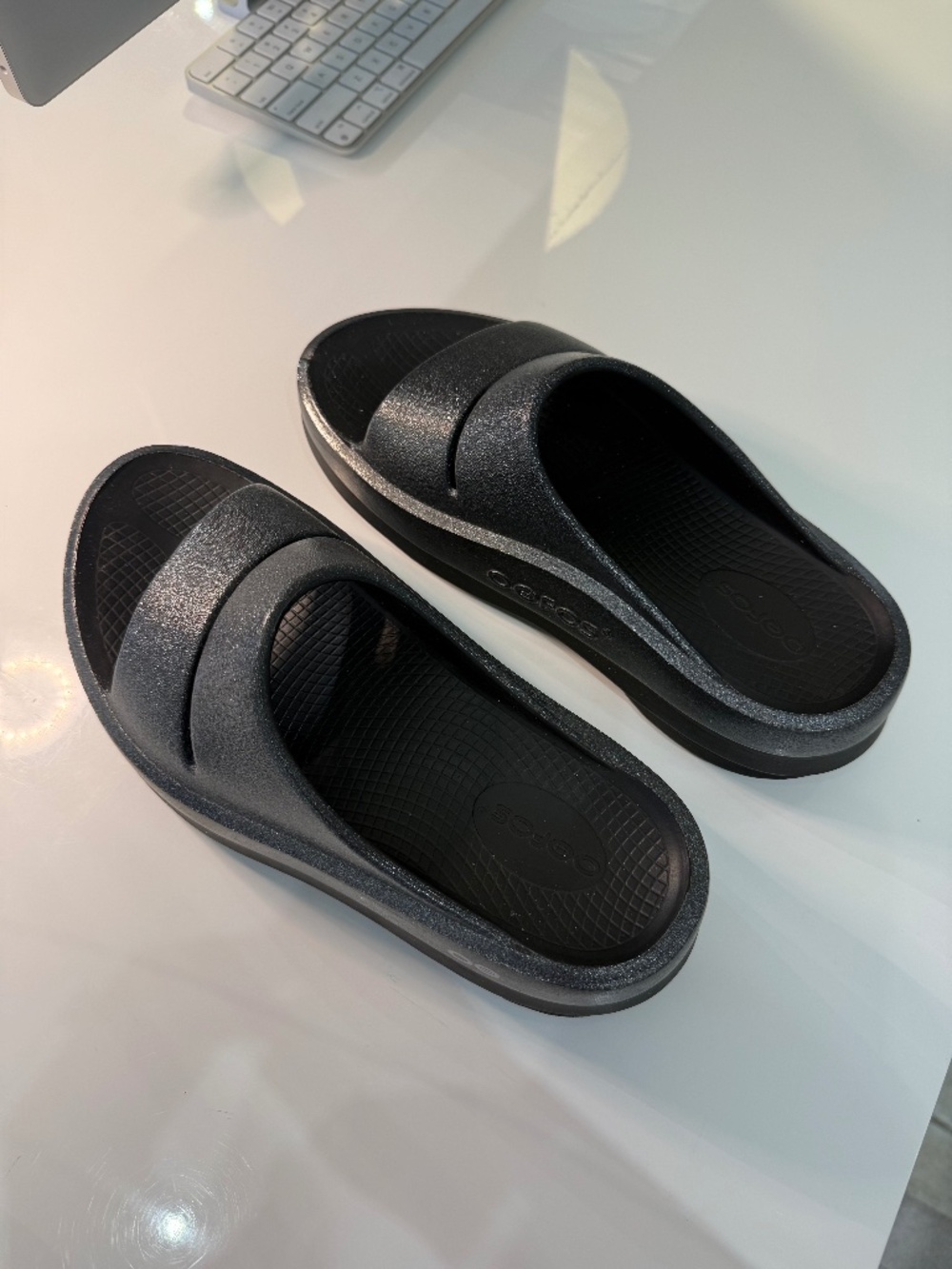 OOFOS Metallic Gray and Black OOmega OOahh Slides